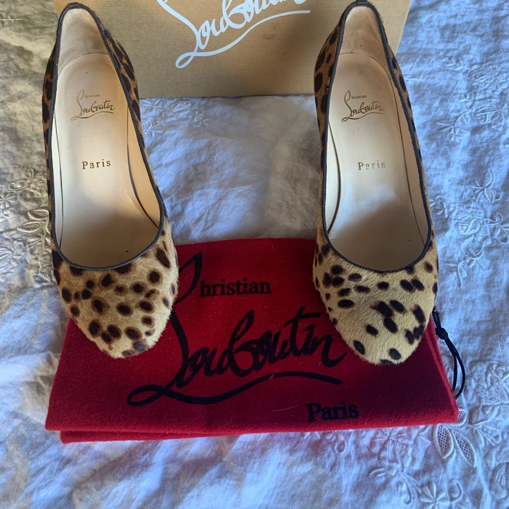 Christian Louboutin animal print wedges